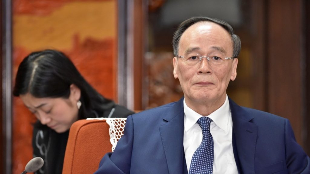 Vicepresidente chino en una reunion