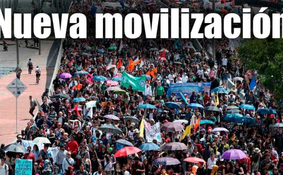 Pese a que avanzan por buen camino las negociaciones Personas en una calle marchando