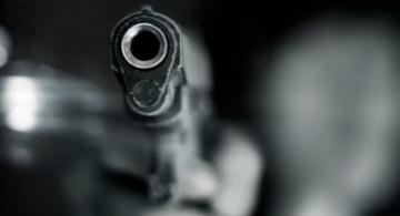 Pessoa com arma