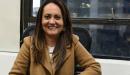 Maria Claudia en una oficina