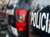 Carros de policia no estacionamento